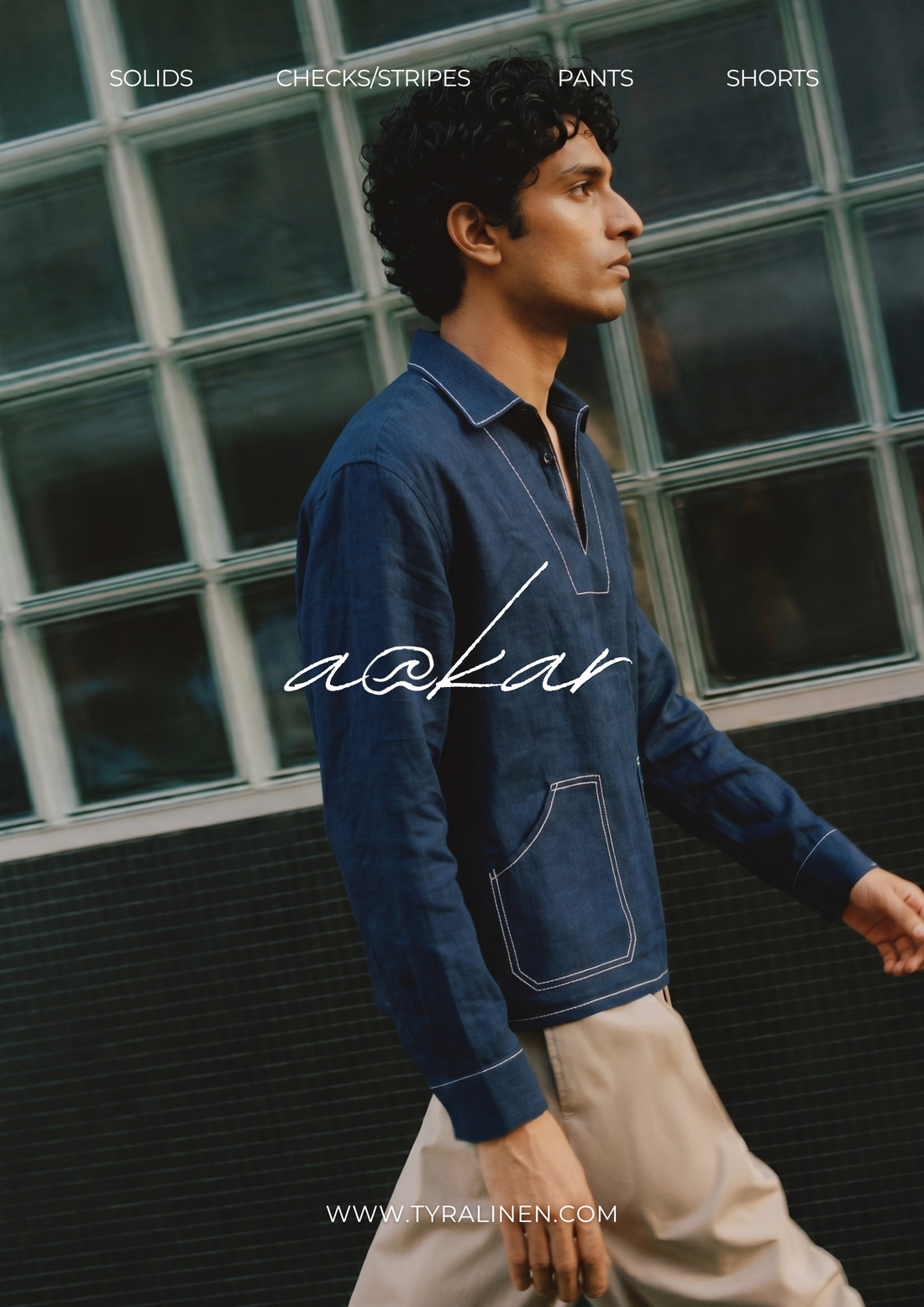 Premium 100% pure European linen popover shirt in indigo blue, styled with sand linen trousers — AAKAR collection by Tyra Linen India