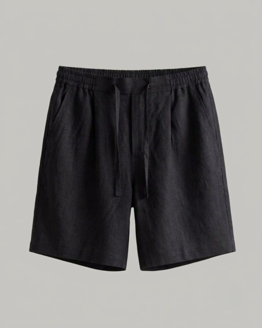  Black linen shorts with an elasticated waistband, adjustable drawstring, side pockets, and a relaxed straight fit.